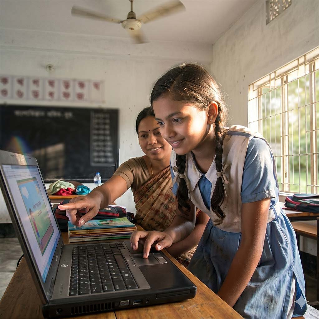 Rural youth using laptops
