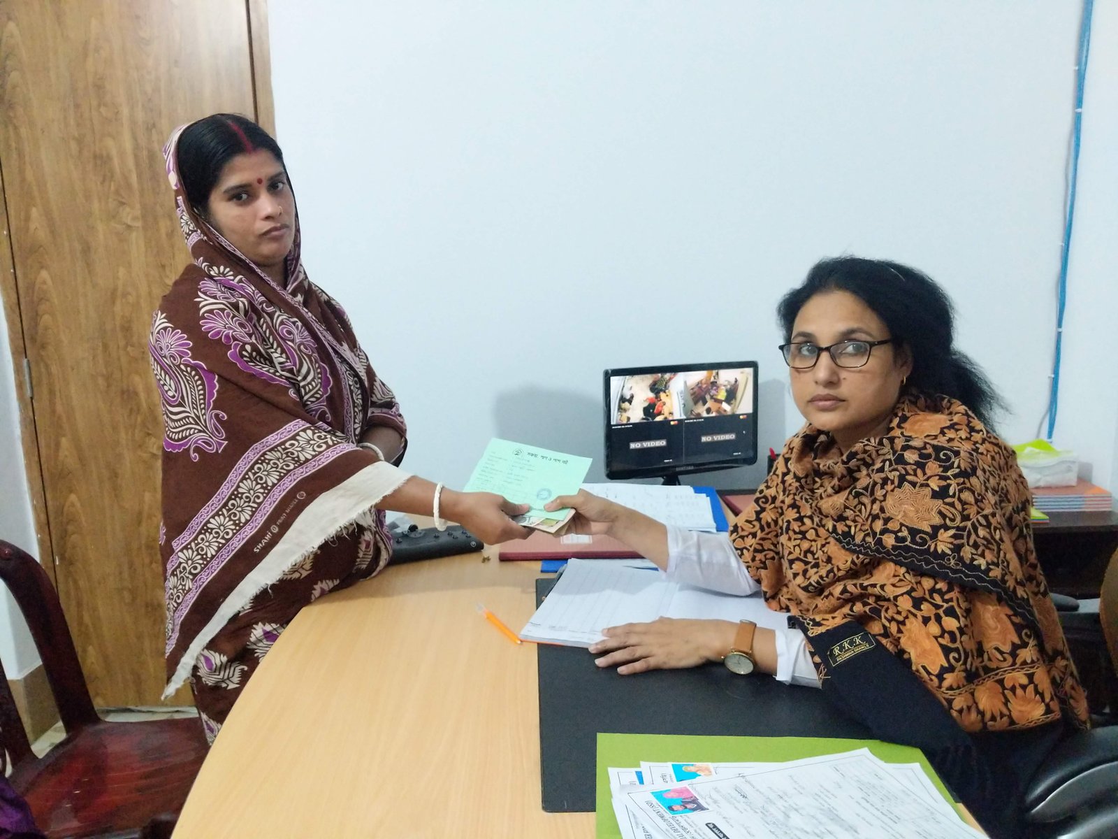 Women participating in a microfinance meeting